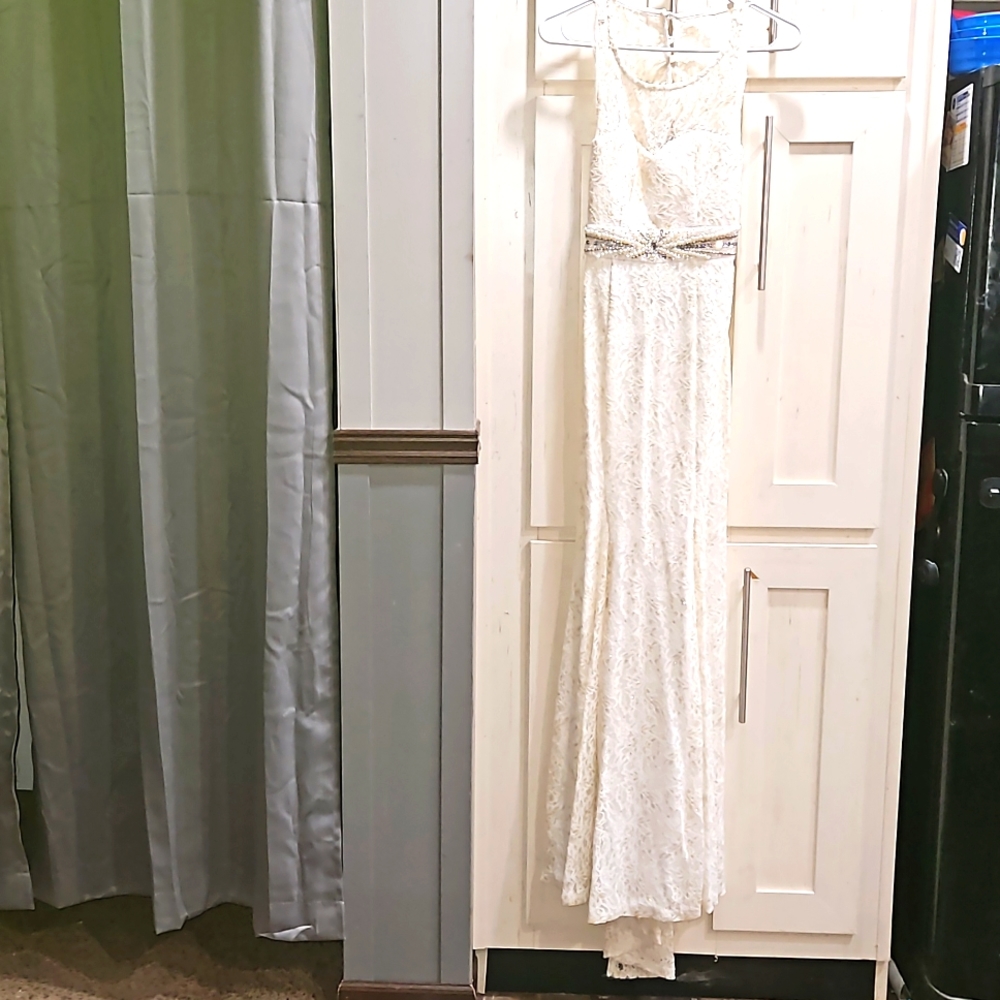 Ivory lace evening gown with gold accent